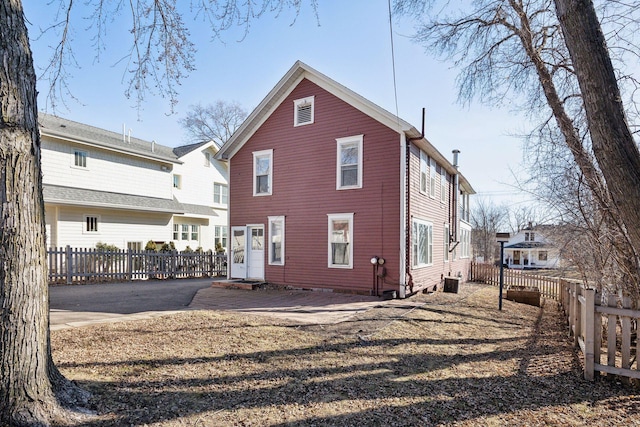 back of property featuring a patio