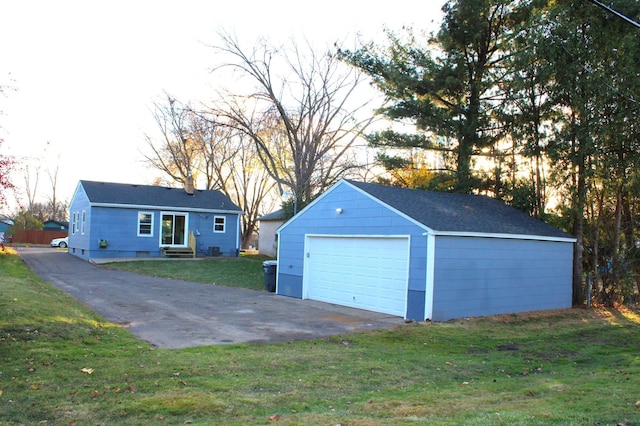 garage with a lawn