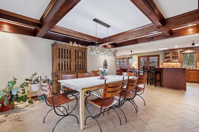 dining room featuring beam ceiling, recessed lighting, coffered ceiling, and french doors