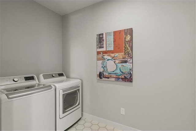 washroom with separate washer and dryer