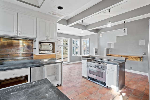 kitchen with white cabinets, decorative light fixtures, a center island, and stainless steel appliances