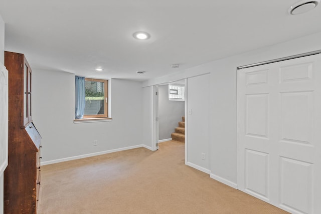 basement with light carpet