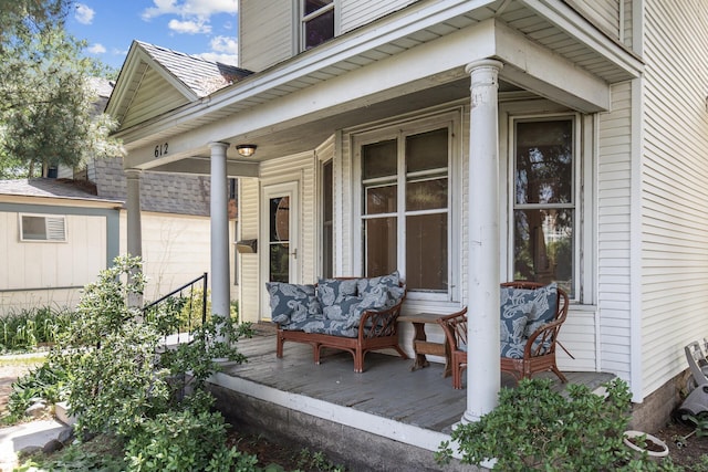 wooden terrace featuring a porch