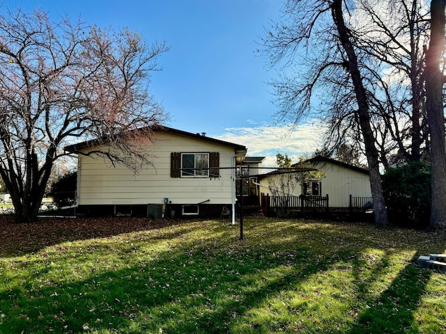 view of property exterior featuring a yard