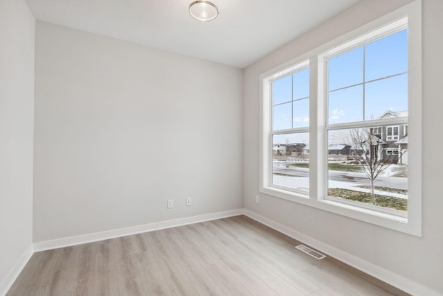 empty room featuring light hardwood / wood-style floors