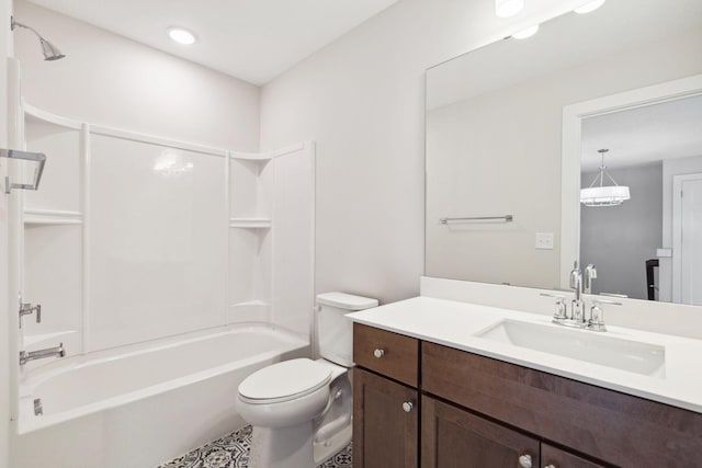 full bathroom featuring  shower combination, vanity, and toilet