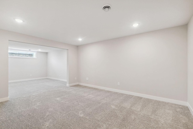 basement with carpet flooring