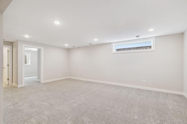 basement with light carpet