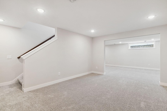 10191 Arrowwood Path, Woodbury, MN 55129 - below grade area featuring recessed lighting, stairway, carpet floors, and baseboards