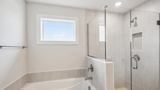 bathroom with independent shower and bath