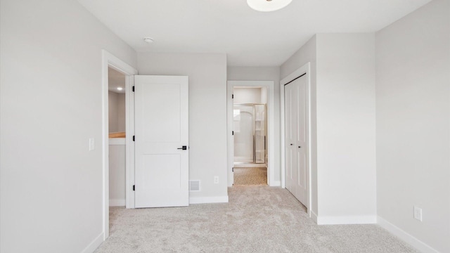 10238 Arrowwood Path, Woodbury, MN 55129 - unfurnished bedroom featuring carpet, ensuite bath, and baseboards