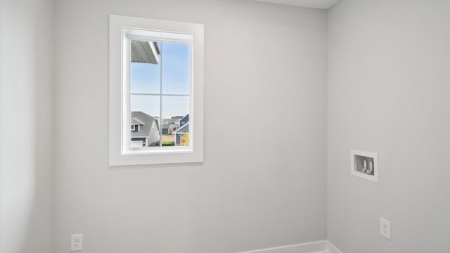 10238 Arrowwood Path, Woodbury, MN 55129 - washroom featuring washer hookup and baseboards