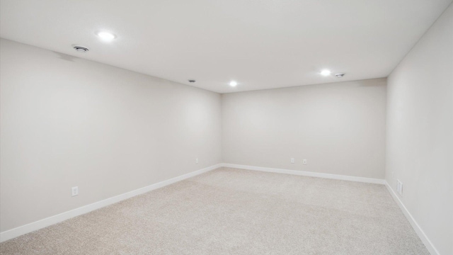 10238 Arrowwood Path, Woodbury, MN 55129 - empty room featuring recessed lighting, light carpet, baseboards, and a smoke detector