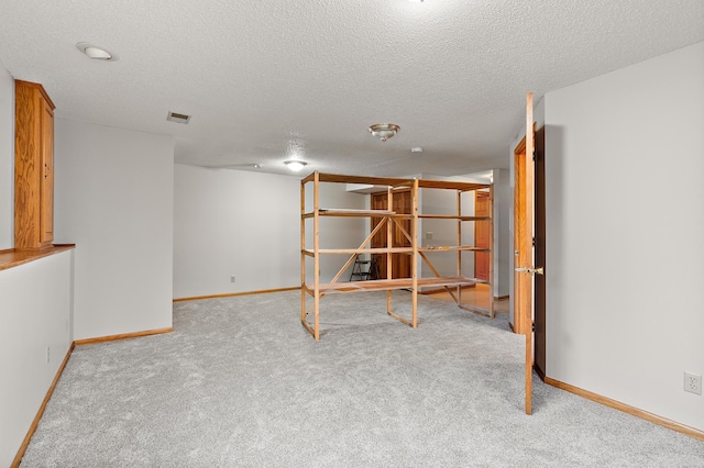 interior space featuring a textured ceiling