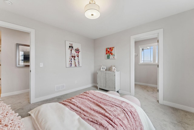 11728 35th St N, Lake Elmo, MN 55042 - bedroom featuring light colored carpet and baseboards
