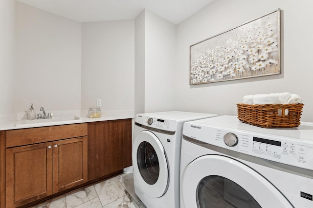 11728 35th St N, Lake Elmo, MN 55042 - washroom featuring washer and clothes dryer, light marble finish floors, and cabinet space