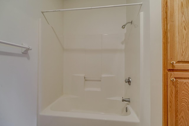 bathroom with shower / bathing tub combination