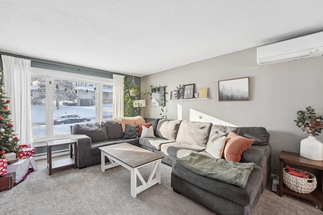 living room with a wall mounted air conditioner, a textured ceiling, and carpet flooring