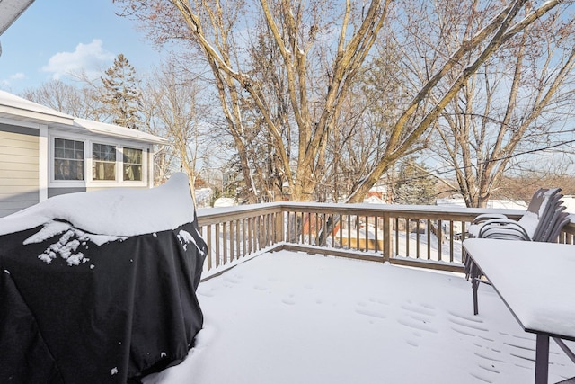 view of snow covered deck