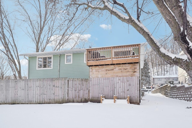 view of snow covered house