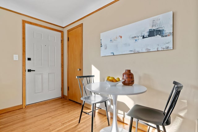 dining space featuring light hardwood / wood-style floors