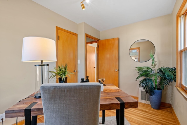 dining area with light hardwood / wood-style flooring