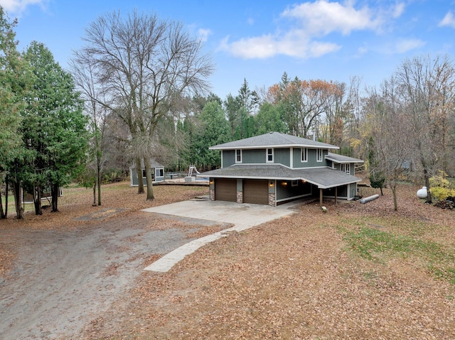 view of front of property featuring a garage