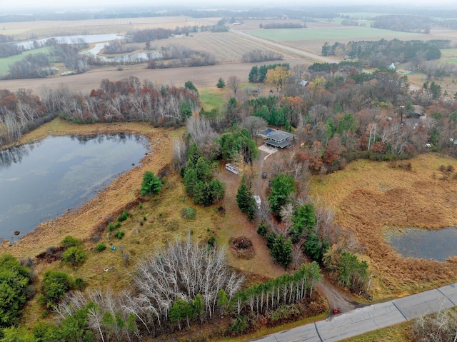 bird's eye view with a water view and a rural view