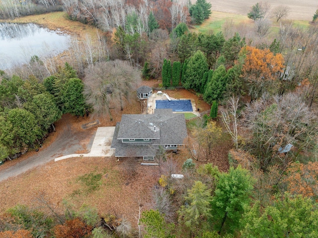 birds eye view of property featuring a water view