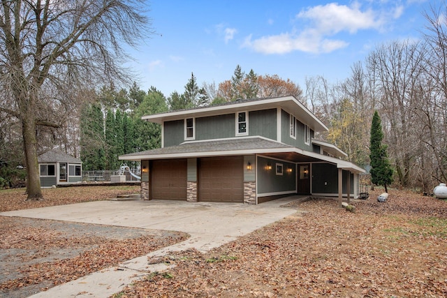 view of front of home with a garage