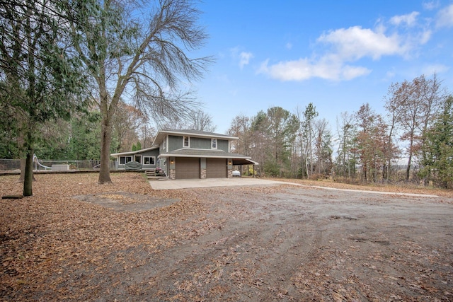 view of front of property with a garage