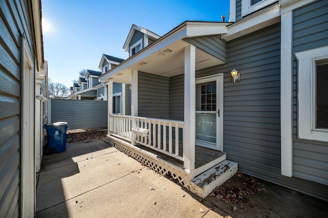 entrance to property featuring covered porch