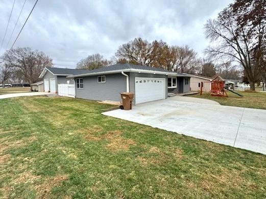 exterior space with a garage and a yard