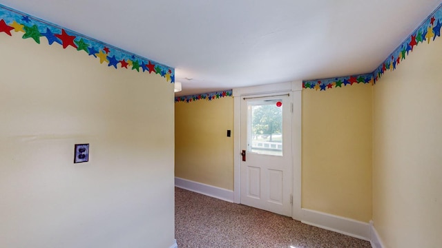 unfurnished room with carpet floors