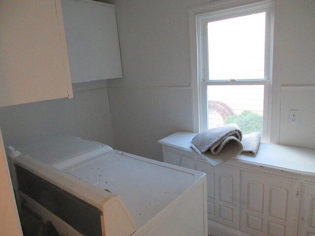 laundry room featuring washer / dryer