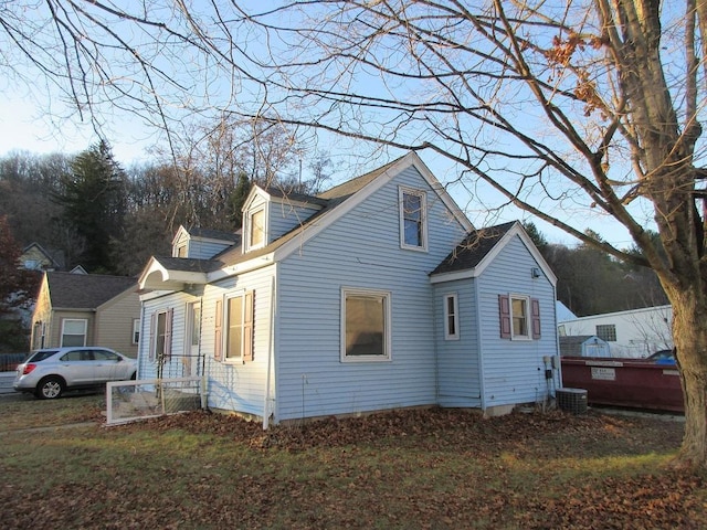 view of side of home with cooling unit