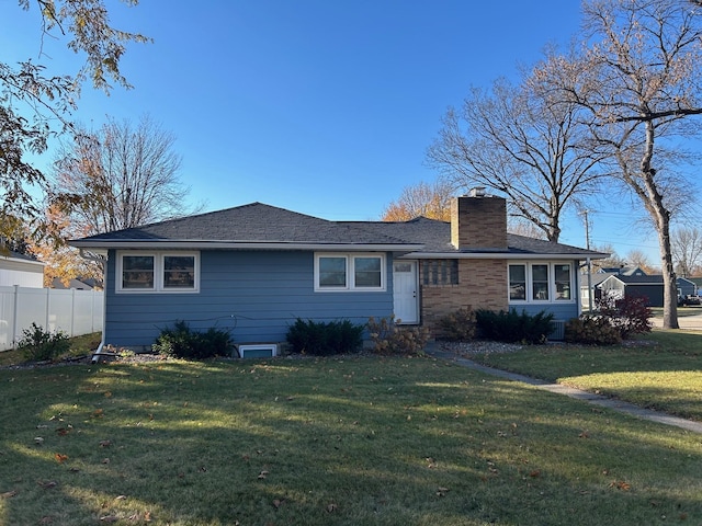 view of front of home with a front lawn