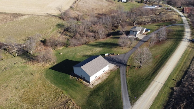 birds eye view of property featuring a rural view