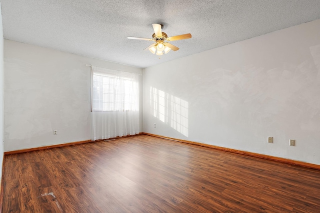 unfurnished room with wood-type flooring, ceiling fan, and a textured ceiling