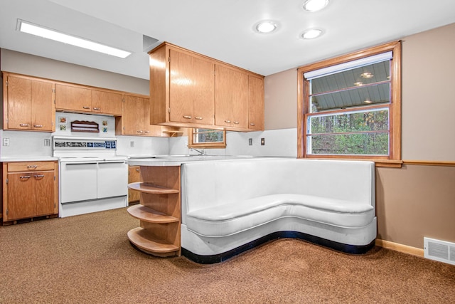 kitchen with white stove