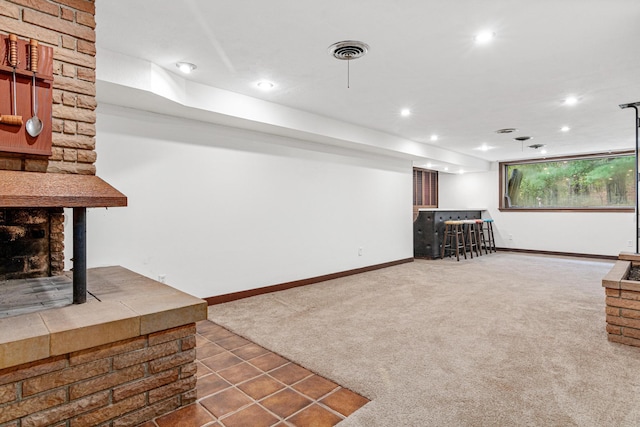 unfurnished living room with carpet floors