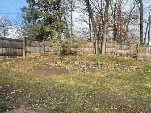 view of yard featuring a fenced backyard