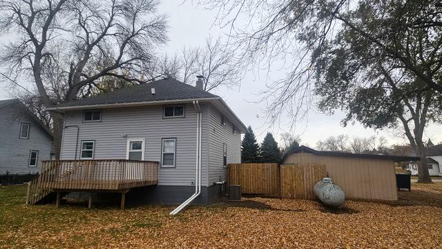 rear view of house with a deck