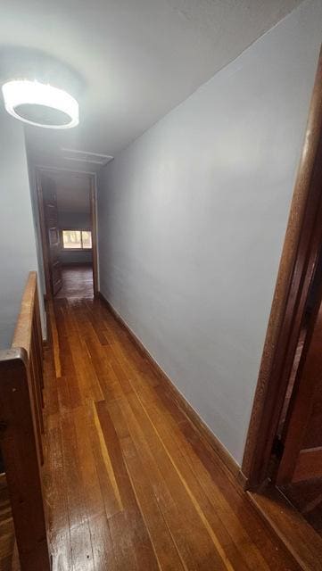 hall featuring dark wood-type flooring