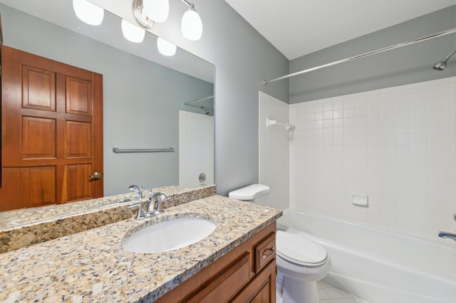 full bathroom featuring tile patterned floors, vanity, toilet, and tiled shower / bath combo