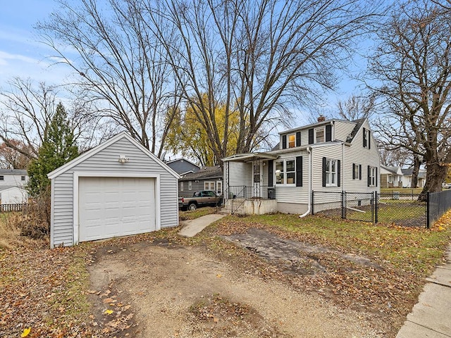 view of front of home with an outbuilding and a garage