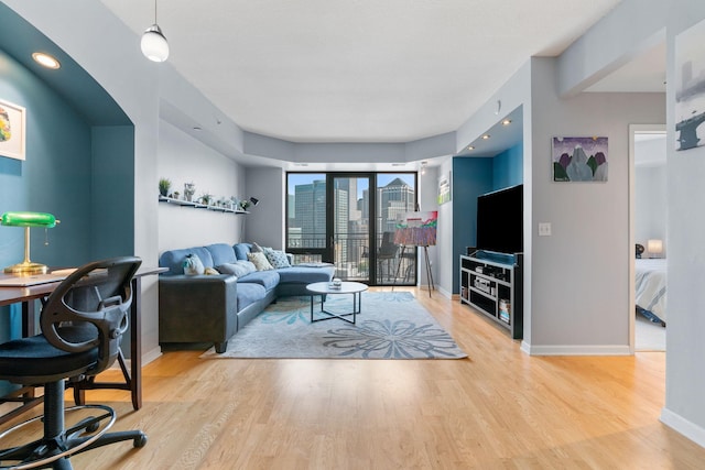 living room featuring light wood-type flooring