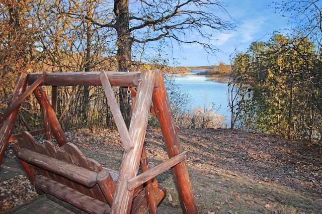 deck featuring a water view