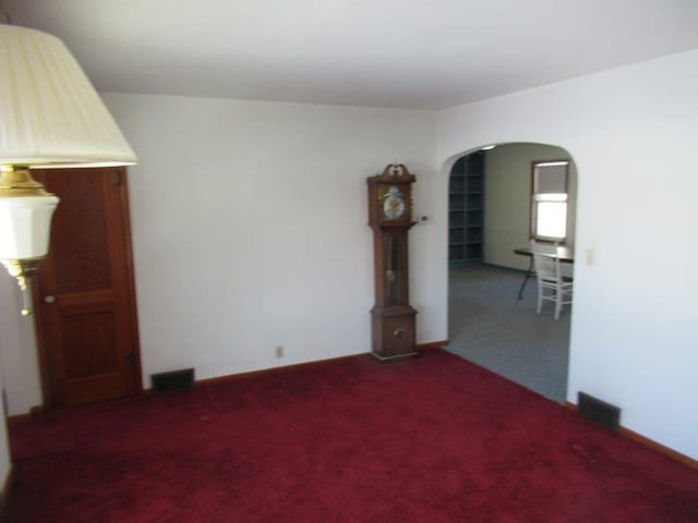 empty room with carpet floors