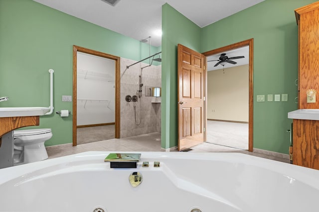 bathroom featuring plus walk in shower, toilet, and ceiling fan